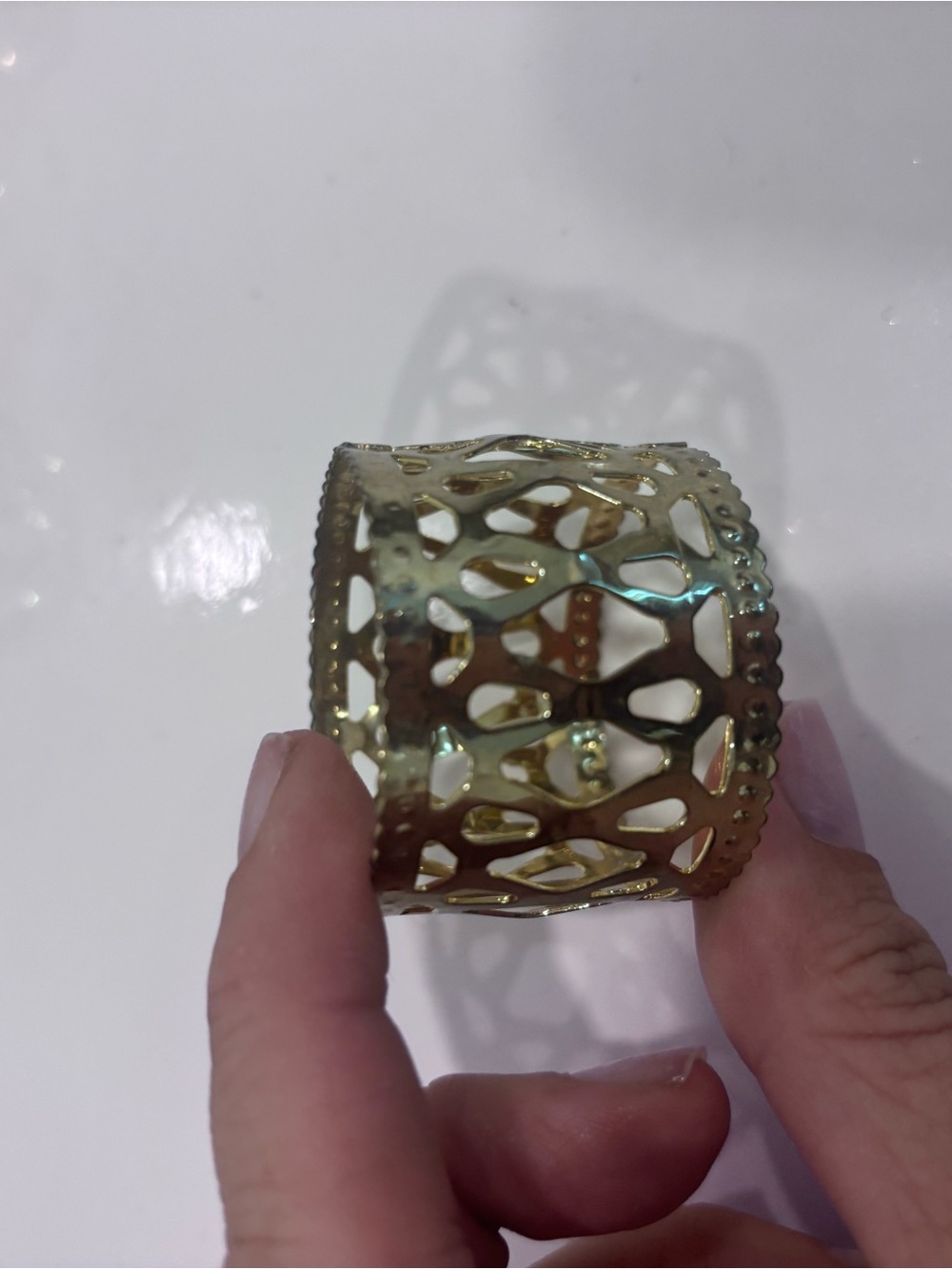 Set of 12 vintage gold toned pierced metal napkin rings-openwork brass look